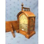 Good Gothic style, honey coloured oak bracket clock with striking movement, silvered arched dial, '