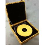 Chinese yellow jade circular disc, cased, 13cm dia. Please check condition before bidding