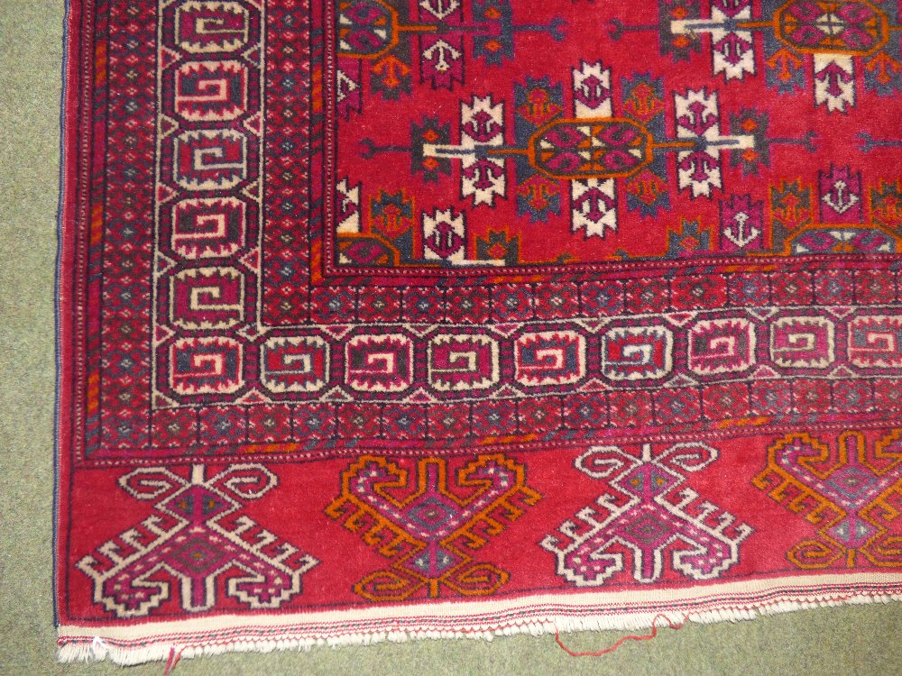 Persian oblong rug burgundy ground with all over geometric pattern and multi border 200 x 130 - Image 2 of 4