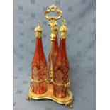 Good Victorian silver plated centre piece decanter stand (engraved) of 3 etched red glass
