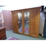 Victorian Country House satin birchwood quadrupled, mirror fronted, fitted compactum, an inside