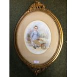 Watercolour of 'Young boy with wheelbarrow', signed E. MOIRA 1870, oval 27 x 21 cm, restored gilt