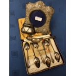 Cased set of six hallmarked silver grapefruit spoons; a small silver purse on chain; a silver