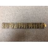 Japanese metal and gold inlaid silver bracelet with character mark to the clasp