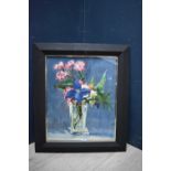 Studio framed oil painting of 'Still life study of flowers in bloom in a glass vase', signed 55 x