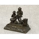 Victorian bronze figure group desk ink stand, 23 cm W