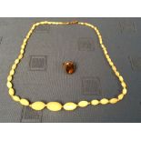 Silver & amber set, ring & Edwardian Mother of pearl necklace