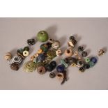 A quantity of beads of various shapes and sizes. Provenance: From the Collection of Seward