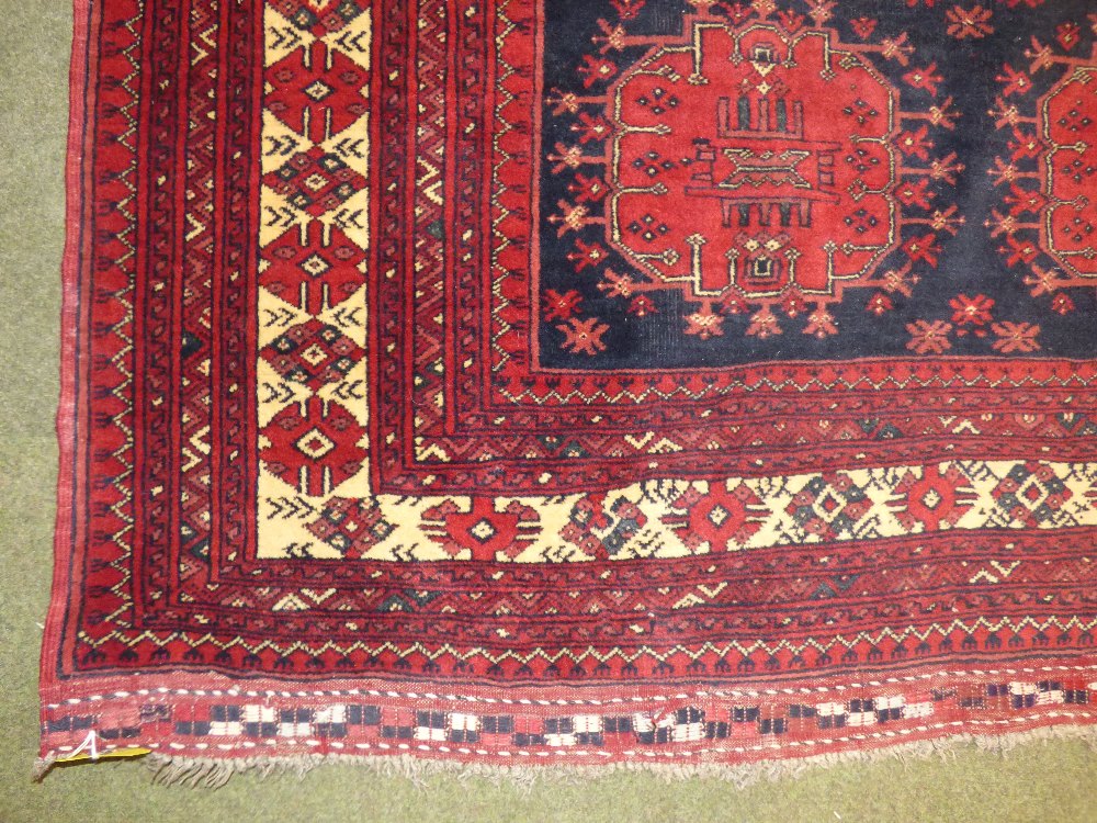 Persian oblong rug and blue central panel of 10 red loztenges with wide terracotta multi border - Image 2 of 2