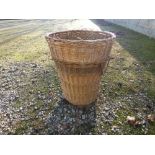 Tall wicker log basket