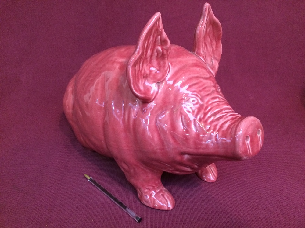 Large Wemyss pink pig with impressed 'Wemyss ware R. H. & S.' 28H x 47L cm