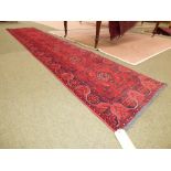 Pakistan hand knotted runner red ground all over geometric and stylized pattern 380 x 77
