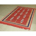 Heavy Persian contemporary design rug, plum red ground, geometric and line pattern