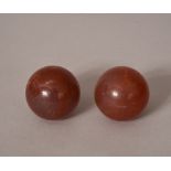 Pair of C19th Chinese agate balls, 4cm diam. Provenance: From the Collection of Seward Kennedy.