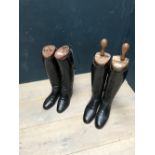 2 pairs of black leather riding boots with wooden trees