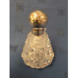 Cut glass conical shape scent bottle with hallmarked silver hinged lid