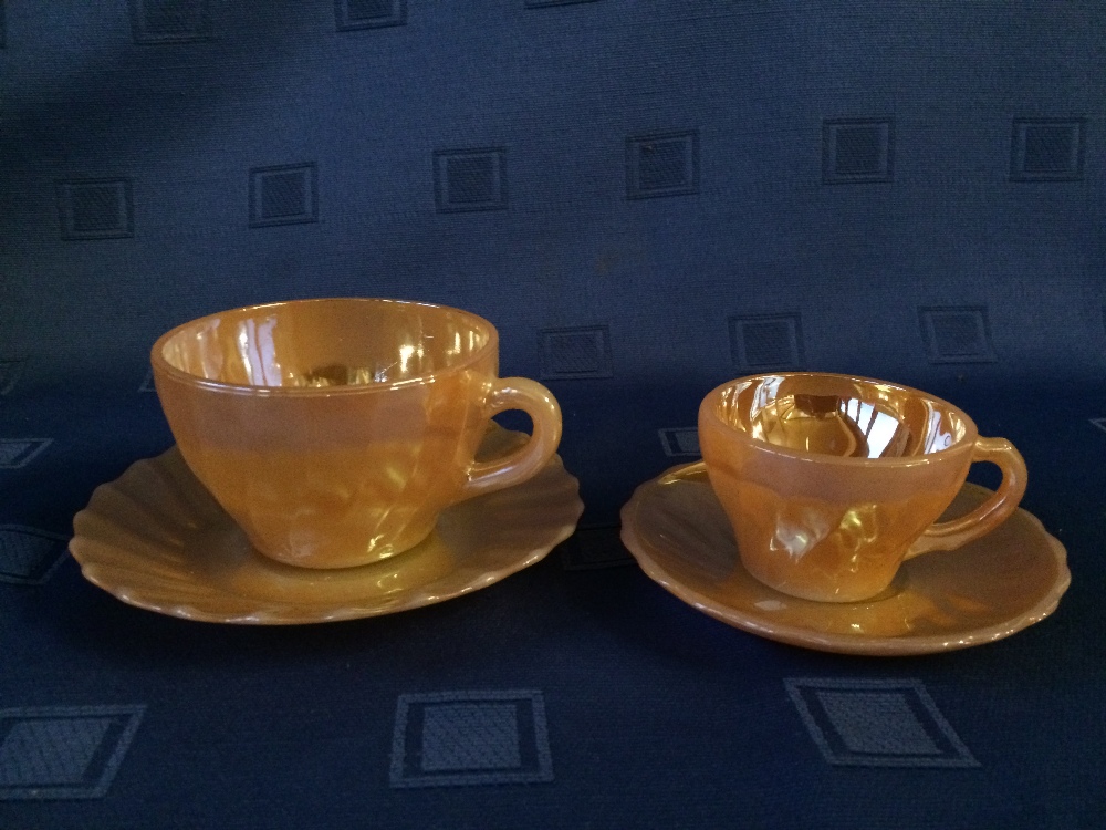 Qty of orange lusterware cups and saucers