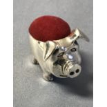 Silver pig pin cushion