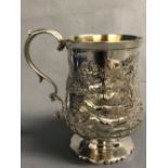 Hallmarked silver tankard, the body heavily embossed with a hunting scene, London 1832, 6.47 ozt