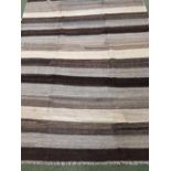 Contemporary rug. with shades of black and grey horizontal stripes 2.86x1.80 metres