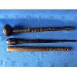 2 tribal clubs/truncheons