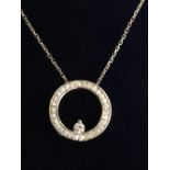 14 carat white gold and diamond set pendant on chain