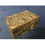 Good hallmarked silver oblong box with hinged lid, gilt interior and extravagantly embossed with