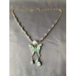 Silver and blue opalite necklace in the form of a butterfly