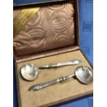Cased pair of Continental silver ladles