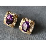 Pair of 14 carat yellow gold, diamond and amethyst earrings