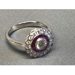 18 carat white gold, diamond and ruby cluster ring, size N, 5g