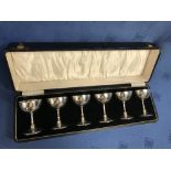 Cased set of 6 hallmarked silver small goblets, 12 ozt