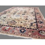 Contemporary fine Ziegler carpet with neutral coloured central ground and black, red & blue floral