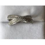 18 carat white gold and diamond cross ring of 75 points