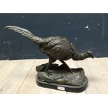 Bronze figure of a Cock Pheasant, bears signature, on marble base, 26Hx46Lcm