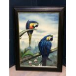 Oil painting, ornithological study of two parrots perched on branches, signed with monogram, in an