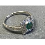Emerald and diamond cluster ring, set in white metal, size N, 3.5g
