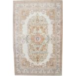 Rare Tabriz carpet, signed Benlian, Persia, with cream ground and delicate and floral and leaf