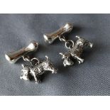 Pair of silver dog and bone cufflinks