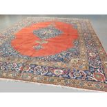 Fine Tabriz carpet, Persia circa 1920s, with central orange medallion ground and all over blue &
