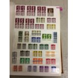 Large collection of GB post office training stamps in a stock book incl. KG VI, QE, postage dues, NI