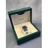 Rolex oyster perpetual stainless steel watch with blue dial, in original box with card