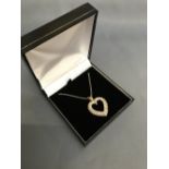Yellow gold and diamond set heart shaped pendant necklace, 3 carats approx.