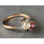 Rose gold, diamond and ruby cross over ring