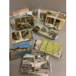 Large qty of postcards, 1900-1950, of Lace making, Paris, British holiday areas, London etc.