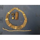 Qty of costume jewellery, a cultured pearl bracelet, composed of 23 pearls with gold coloured