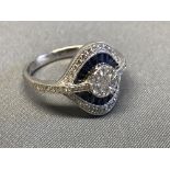 18 carat white gold, sapphire and diamond cluster ring, size N, 4.1g
