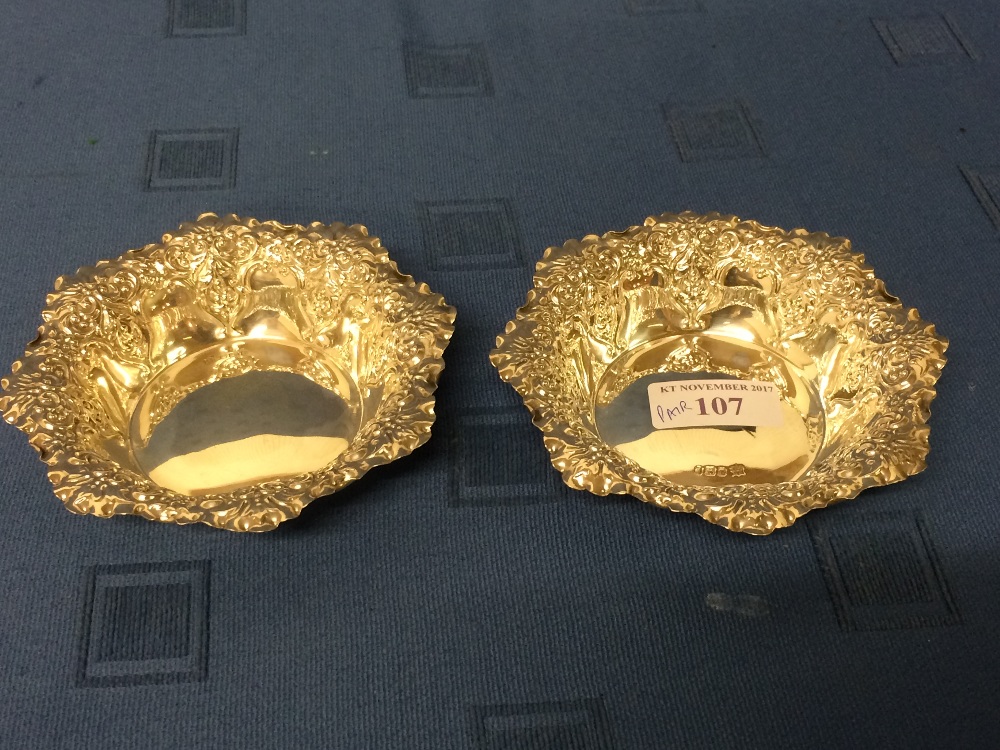 Pair of hallmarked silver octagonal embossed bon bon dishes