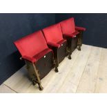 Block of 3 vintage theatre seats, upholstered in red velour with cast iron sides