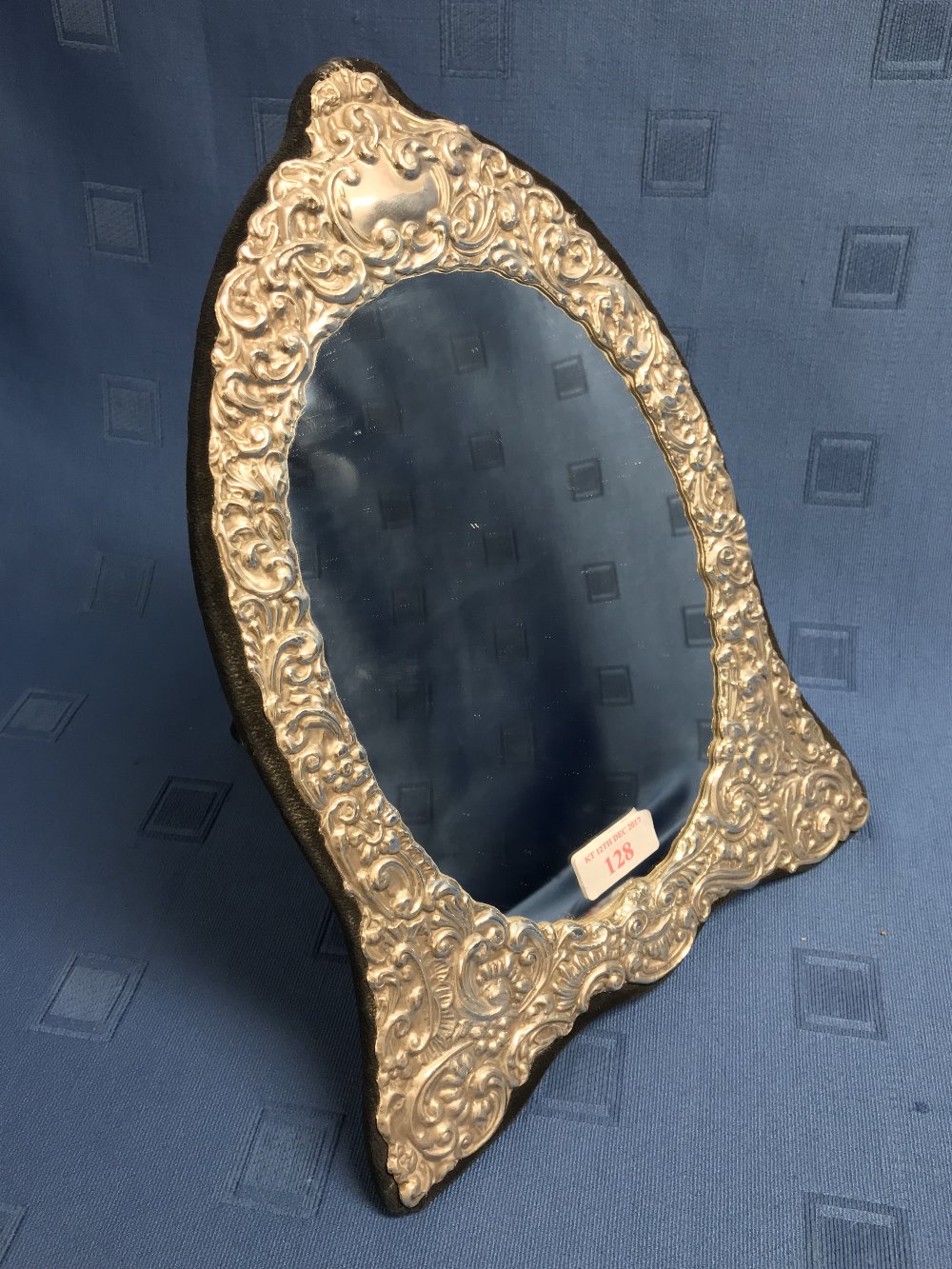 Hallmarked silver oval embossed dressing table mirror, 31cmH